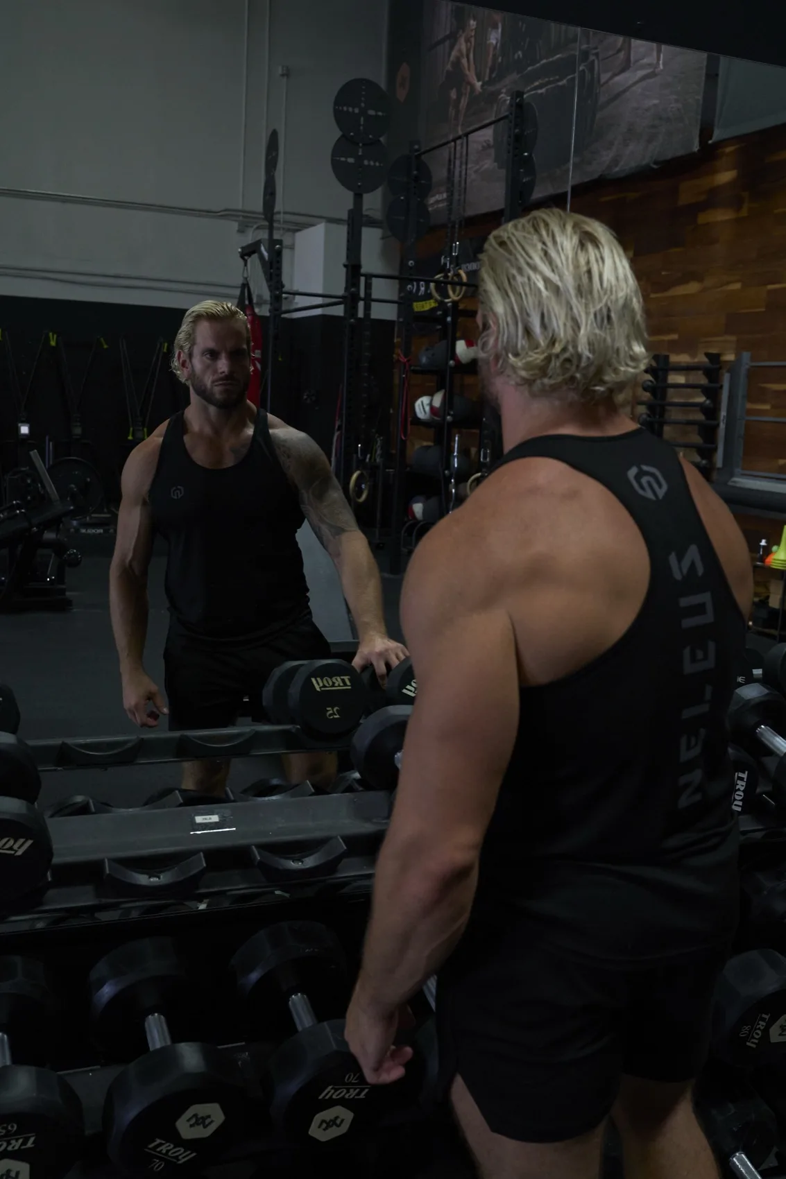 Jarred Curcio facing his reflection in the mirror at The Focus Room gym in East Austin
