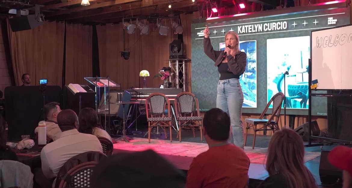 Katelyn Curcio on stage with the full panel at The Focus Lab in Austin, Texas