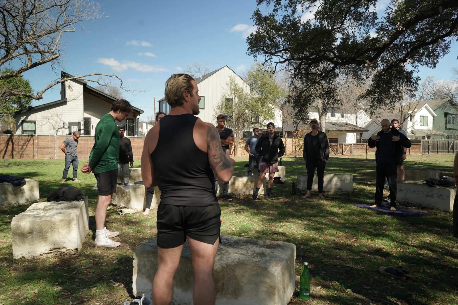 Jarred Curcio with a training group outdoors in Austin, Texas